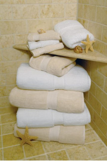 27" x 54" Oasis® White 16 lb. Hotel Bath Towel